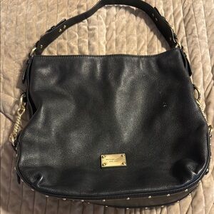 Michael Kors Black Hobo Bag with Gold Accents